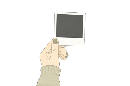 Hand hält ein leeres Foto als Symbol für Trauer, Verlust und Abschied